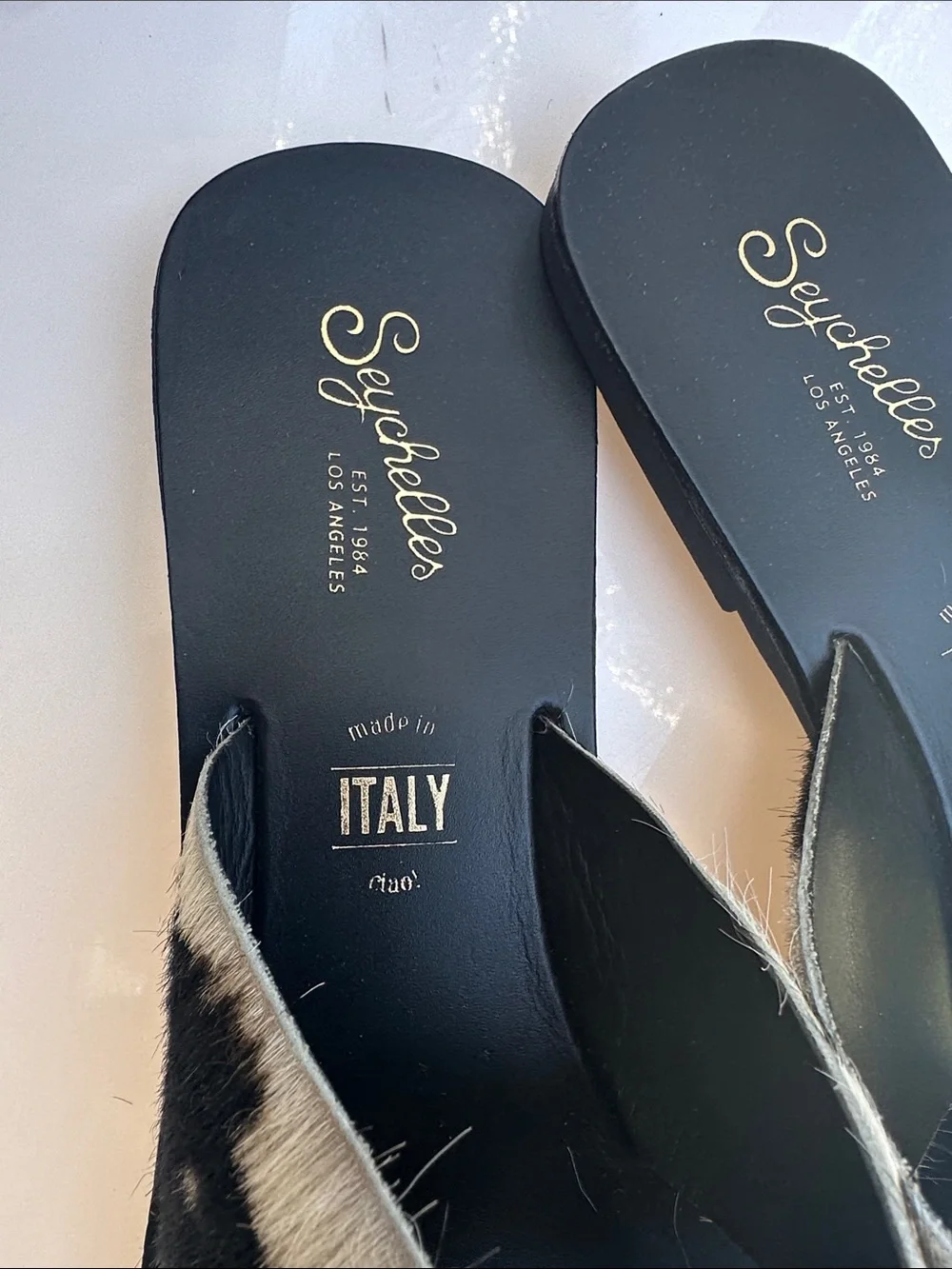 Seychelles Black and White Cowhide Crossband Slides